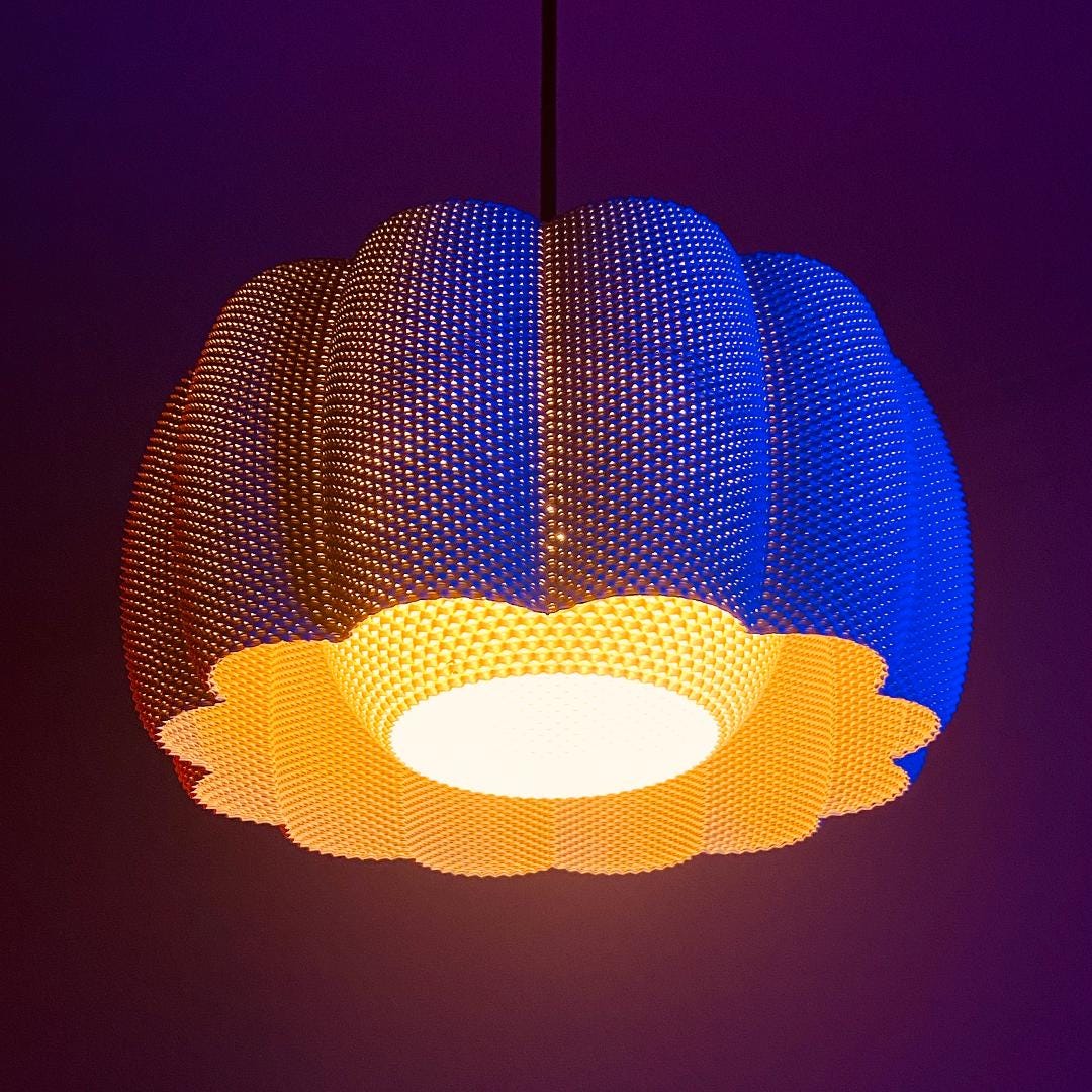 Ara Smooth Ripple Shade with diffuser.