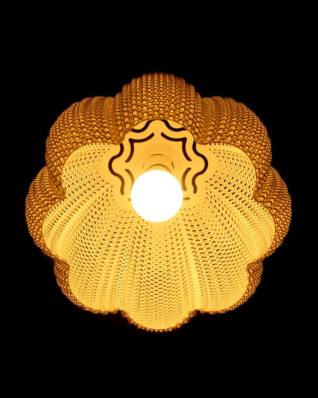 Decorative light fixture with a textured design