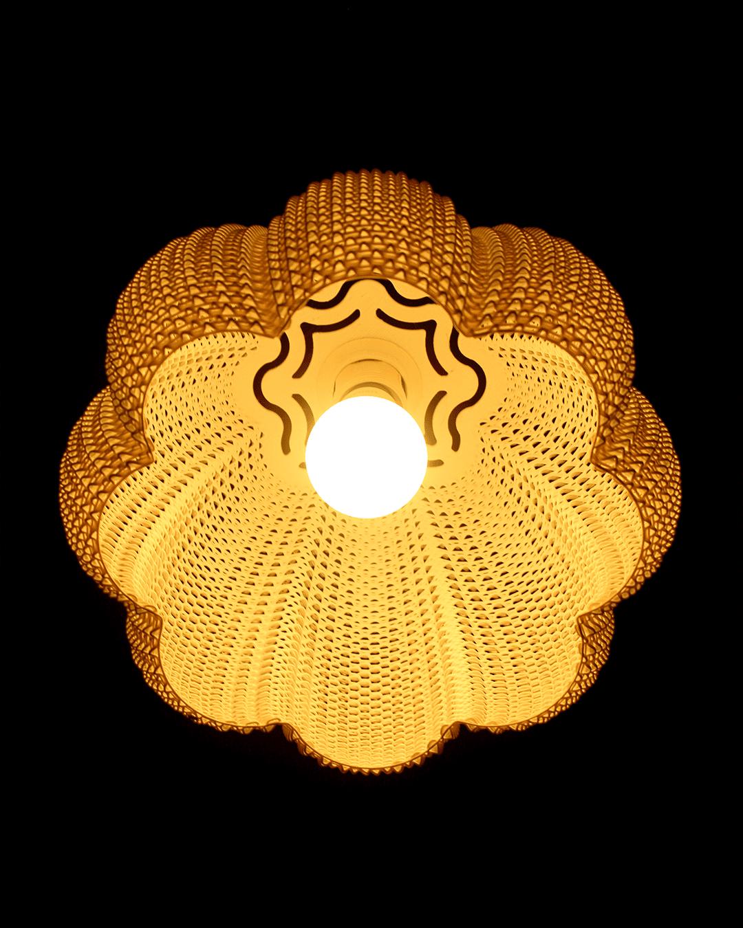 Decorative light fixture with a textured design